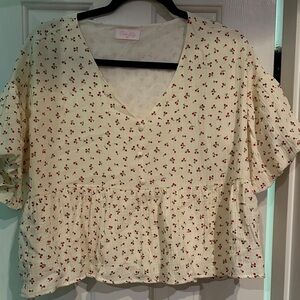 Pink Lily Cream Blouse with Red Floral Pattern. Like new